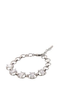 Ezüst színű karkötő, amely váltakozó ovális és téglalap alakú láncszemekből áll, négy téglalap alakú átlátszó kővel. Simább textúrájú, kapoccsal záródik.