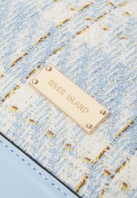 River Island Mala de mão - blue light