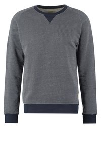 Navy blue crewneck sweatshirt with a herringbone pattern, ribbed cuffs, and hem. Features a v-notched neckline and textured fabric.