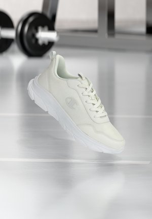 Light gray athletic shoe with a textured fabric upper, white laces, and a thick white sole. Features a logo on the side.