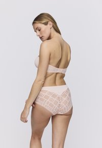 Bra and high-waisted brief set in soft pink, featuring lace accents and a grid pattern. Smooth fabric with a hook closure on the back.