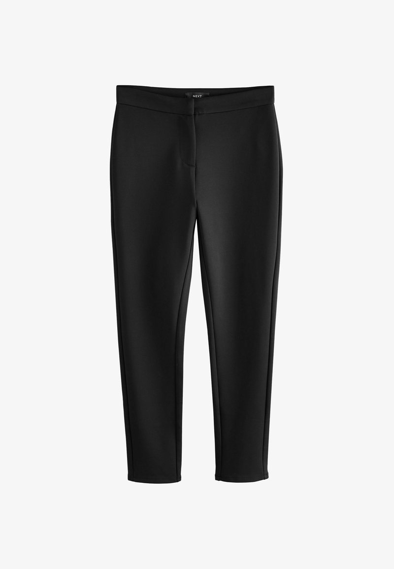 Sorte leggings lavet af glat, strækbart stof med en tætsiddende pasform, der har en mellemhøj talje og ingen synlige sømme eller dekorationer.