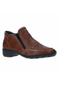 Bottines en cuir marron avec fermeture éclair sur le côté, détails cousus, bout rond et semelle en caoutchouc. Surface texturée et design moderne.