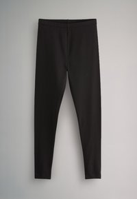Čierne legíny s úzkym strihom a vysokým pásom, zobrazené na neutrálom sivom pozadí.