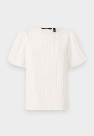 Valkoinen pufihuulisetti, jossa on tekstuuriset pystysuorat raidat, pyöreä kaula-aukko ja pehmeä kangas; sisältää rentoa sovitusta ja hienovaraista kiiltoa.