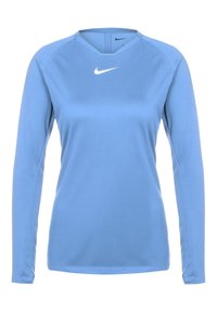 Lichtblauw sporttop met lange mouwen, gemaakt van gladde stof. Voorzien van een V-halslijn en een klein wit Nike-logo op de borst.