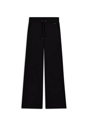 Pantalons larges noirs en tissu doux avec une taille à cordon, comportant des poches avant et une texture lisse.