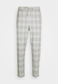 Lichtgrijze geplaatste broeken met een trekkoord in de taille, voorzien van een geweven textuur en een tapering design. Geschikt voor casual gebruik.