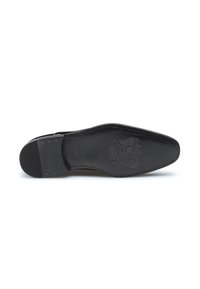 Semelle en cuir noir avec une surface lisse, une légère texture et des détails d'emblème. Caractéristique d'un bout pointu et d'un talon bas.