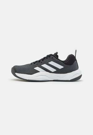 Black and gray athletic sneaker with white sole and three white stripes on the side, shown from the inner side on a white background.