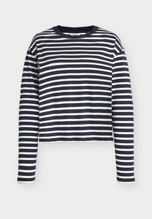 Μπλε ναυτικό και λευκό ριγέ βαμβακερό τοπ με μακριά μανίκια, στρογγυλή λαιμόκοψη και cropped σχεδιασμό. Διαθέτει μανίκια με ευθεία κοπή και μαλακή υφή.