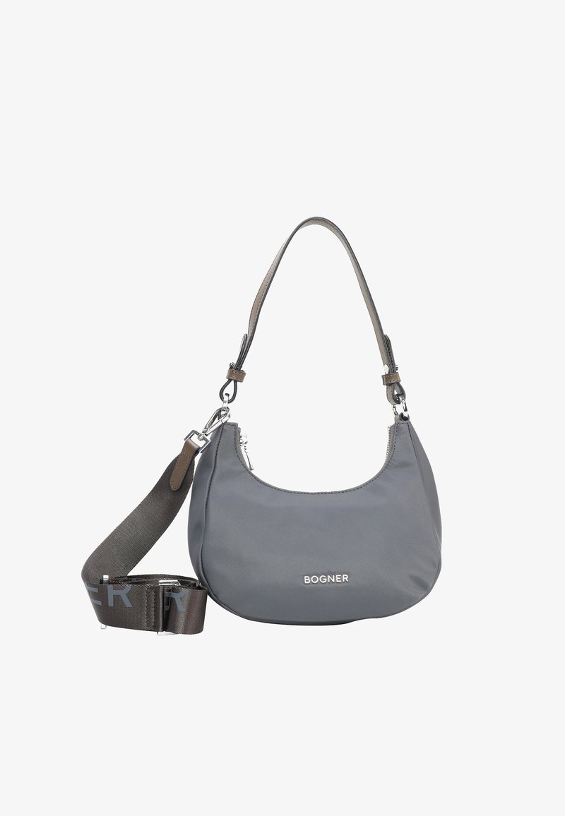 Harmaa nailonista valmistettu olkalaukku, jossa on kaareva siluetti, hopeinen logo, irrotettava hihna ja sileä pinta. Vetoketjulla suljettava yläosa.