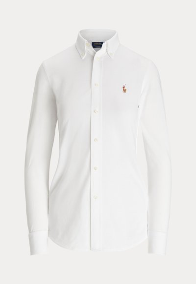 White long-sleeve button-up shirt with button-down collar and small embroidered polo player logo on the chest.