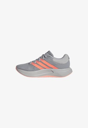 Gray athletic shoe with mesh upper, orange stripe accents, rounded toe, and textured rubber sole. Features traditional lacing system.