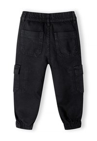 Pantalons cargo noirs en denim, dotés d'une taille élastique, de poignets resserrés et de multiples poches à l'arrière et sur les côtés.