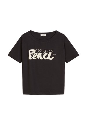 Black cotton t-shirt with a loose fit and short sleeves. Features "Peace" in white cursive text across the front. Soft texture, simple design.