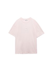 Lyserød bomulds T-shirt med afslappet pasform. Korte ærmer, rund halsudskæring og en lille broderet tegneserieblekksprut på forsiden.