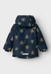 Mörkblå vinterjacka med huva, med färgglada tigertryck. Slät yttermaterial med elastiska ärmslut och en reflekterande detalj vid fållen.