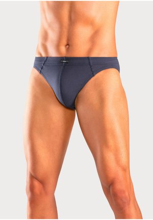 Marineblaue Baumwollslips mit niedriger Taille, entworfen mit glatten Nähten und einem kleinen Logo-Label auf der Vorderseite.