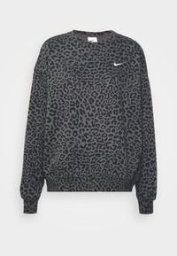 Sudadera negra y gris con un diseño de estampado de leopardo, mangas largas y un cuello redondo, con un pequeño logo de Nike en blanco en el pecho.