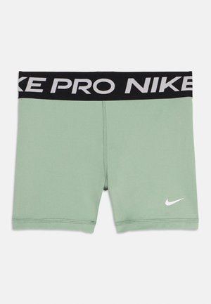 Mintgrønne Nike Pro-kompresjonsshorts med svart elastisk linning som har hvit "NIKE PRO"-tekst og liten hvit Nike Swoosh-logo.