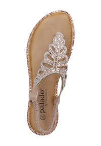 Beige sandal med ett bladformat mönster i metallaccenter och rhinestones. Har en vadderad sula och dekorativt broderi längs sulan.