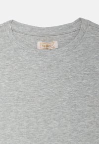 Gray ribbed cotton t-shirt featuring a round neckline and a tag labeled "FRIBOO." Texture is soft and smooth with subtle pattern variations.