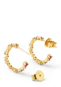 Gold-tone hoop earrings featuring a spiked design, adorned with red and clear gemstones. Includes a secure backing with a 925 stamp.
