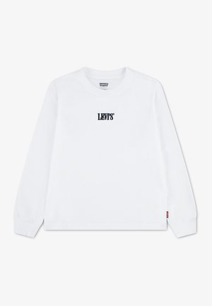 Chemise blanche Levi's à manches longues avec texte du logo noir centré sur la poitrine et petite étiquette rouge sur la couture latérale près de l'ourlet.