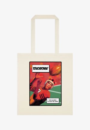 Joueur de football avec un casque vintage attrapant le ballon, avec les textes « Touchdown ! » et « Il a marqué pour gagner le match ! » sur un sac fourre-tout.