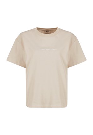Béžové bavlnené tričko s uvoľneným strihom, krátkymi rukávmi a okrúhlym výstrihom. Na prednej strane je biely nápis "Aim’n' Sportswear".