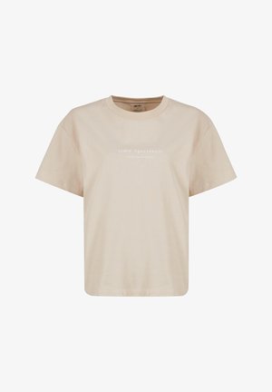 Beige pamut póló laza szabással, rövid ujjal és kerek nyakkivágással. Az elején fehér színű "Aim’n' Sportswear" szöveg található.