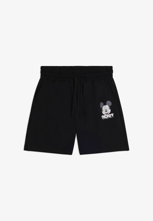 Shorts neri con vita elastica e cordoncino, tasche laterali e un volto di Topolino bianco con testo sulla parte bassa della gamba destra.