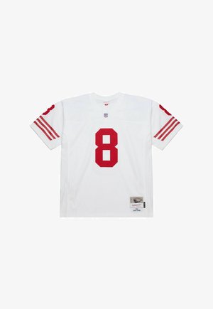 White NFL jersey with red number 8 on front and sleeves, featuring red stripes on short sleeves and a patch labeled "1984 Steve Young" near the hem.
