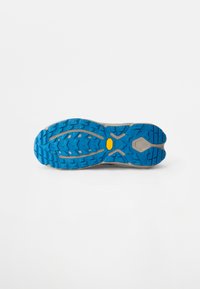 Semelle en caoutchouc bleue avec un motif de treads robuste, talon renforcé et un accent jaune près du centre pour l'adhérence et la durabilité.