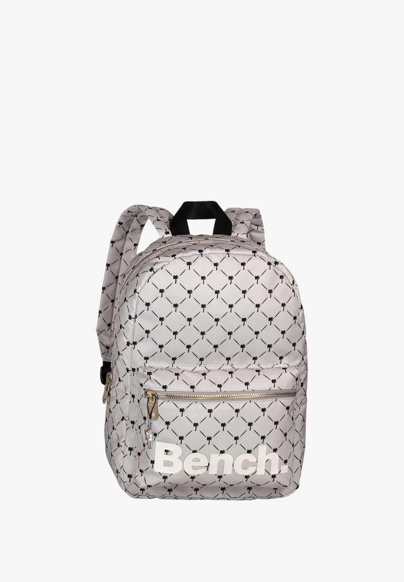 Backpack featuring a gray fabric with a black pattern of small shapes, a front zip pocket, and a large white logo on the lower front.