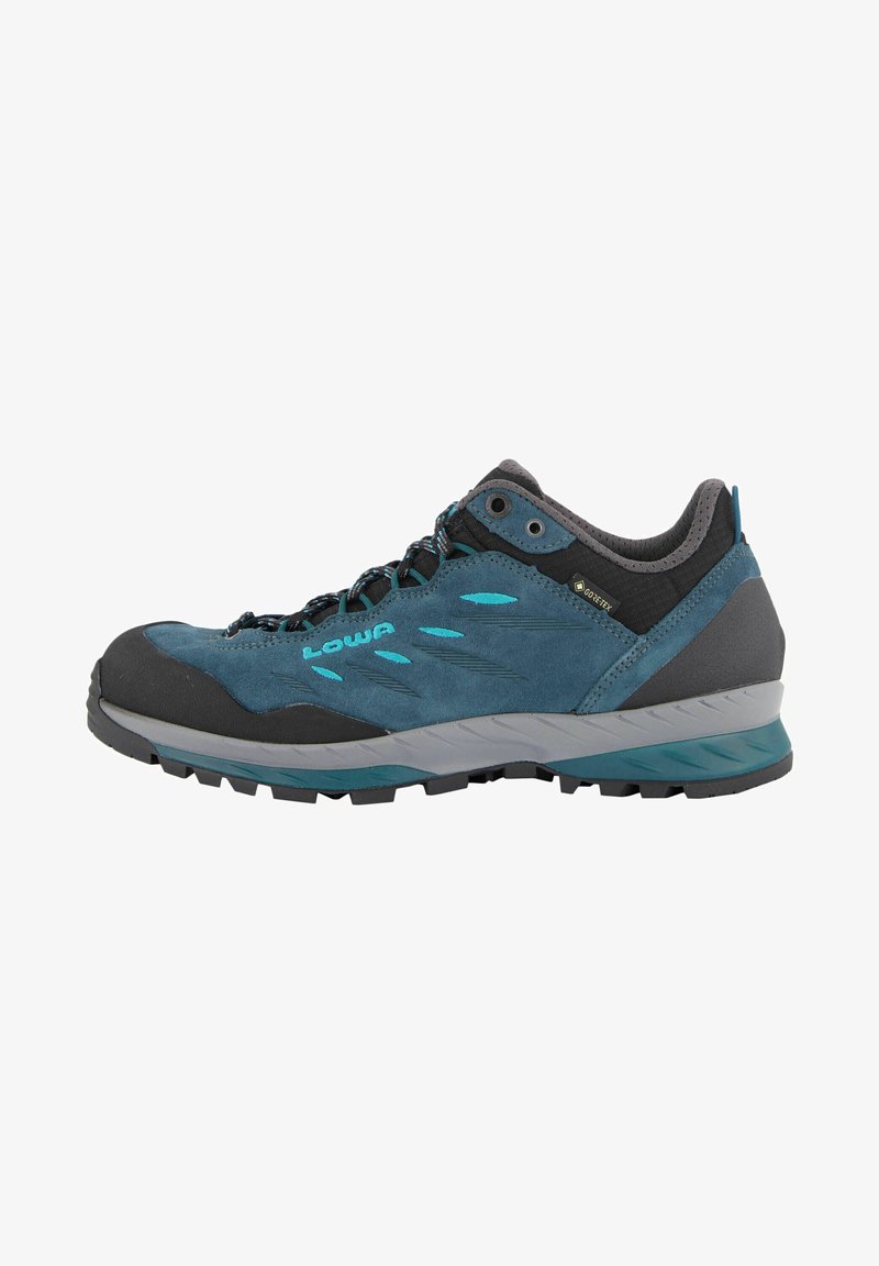 Low-cut hiking shoe featuring a dark blue suede upper with black accents, a rubber toe cap, and a textured gray-and-teal treaded sole.