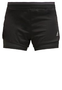 Svarta Adidas damsportshorts med lagerdesign och liten logga på nedre högra benet.