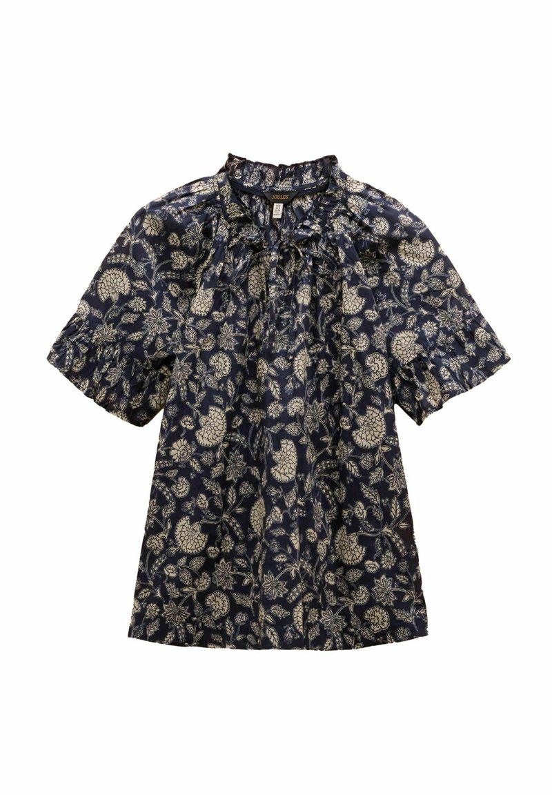 Tmavo modrá blúzka s krátkym rukávom s kvetinovým vzorom v krémovej farbe. Má zhromaždený výstrih a štruktúrovanú tkaninu s naberanými rukávmi.