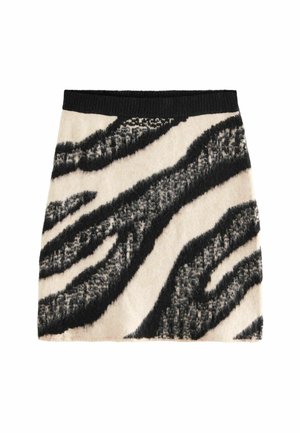 Strik mini nederdel med et sort og hvidt zebrastribemønster, blød tekstur og en sort talje.