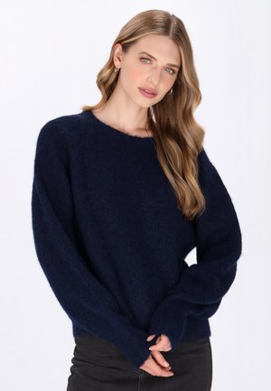 Maglione di maglia blu navy con una vestibilità rilassata, maniche ampie e una finitura testurizzata. Presenta un collo rotondo e polsini a costine.