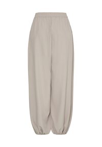 Pantalon beige coupe ample avec taille élastique et bas élastiqués froncés aux chevilles, conçu pour le confort et un usage décontracté.