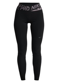 Leggings de sport noirs avec un design ajusté et un tissu extensible. Présente une taille large avec le texte "Nike Pro" et un logo sur la jambe.