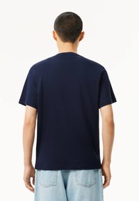 Lacoste Apdrukāts T-krekls - navy blue expresso
