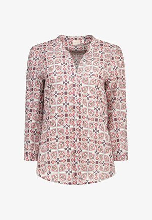 Blouse met lange mouwen en knopen met roze, beige en bruine geometrische en bloemrijke print op witte achtergrond.