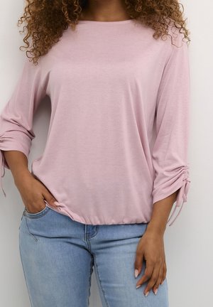 Světle růžový dlouhý rukáv top s kulatým výstřihem a nařasenými, nastavitelnými manžetami; měkká, lehká látka; volný střih.