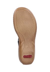 Rubber shoe sole with textured pattern, featuring a brown exterior and a red logo imprint. Size marker “37” on the base.