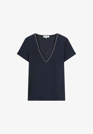 T-shirt bleu marine à col en V et à manches courtes, avec une bordure en argent le long de l'encolure. Fabriqué en tissu léger et doux.