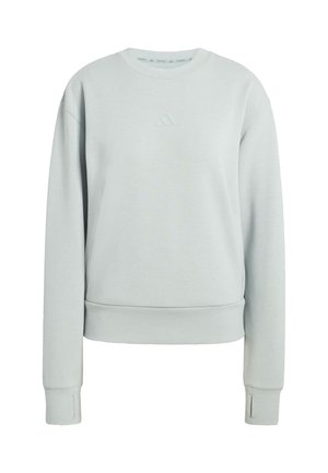 Light grey sweatshirt made of soft fabric, featuring a crew neck, ribbed cuffs, and a small embossed logo on the chest.