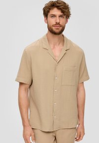 Korte mouw, knoopsluiting overhemd in beige, met textuur, voorzien van een borstzak, een notch-kraag en een relaxte pasvorm.